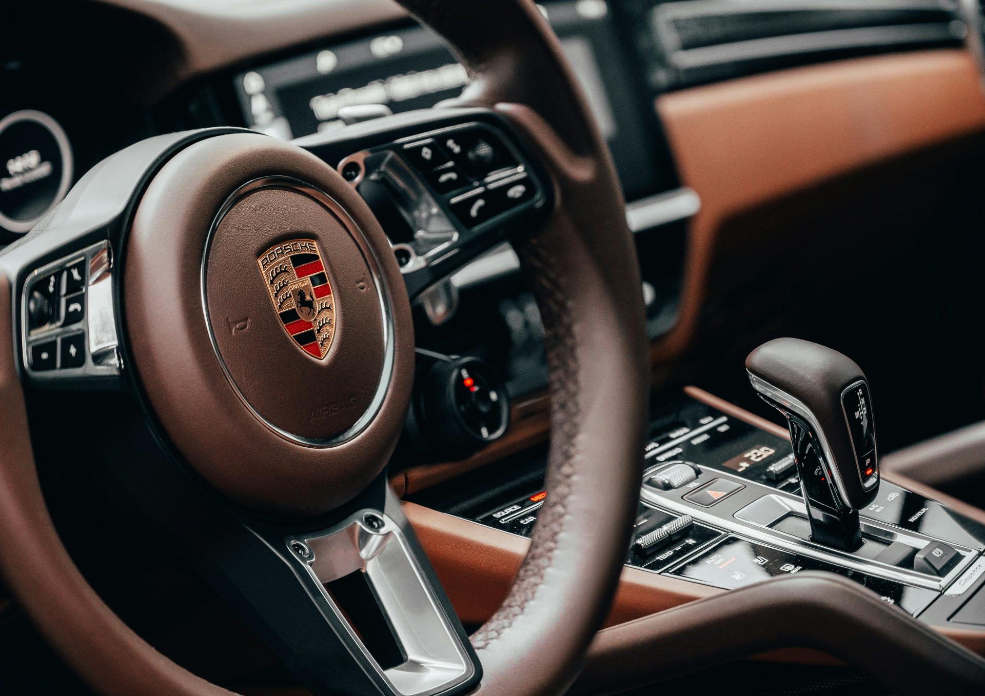 Porsches winding through Prince Edward County wine country